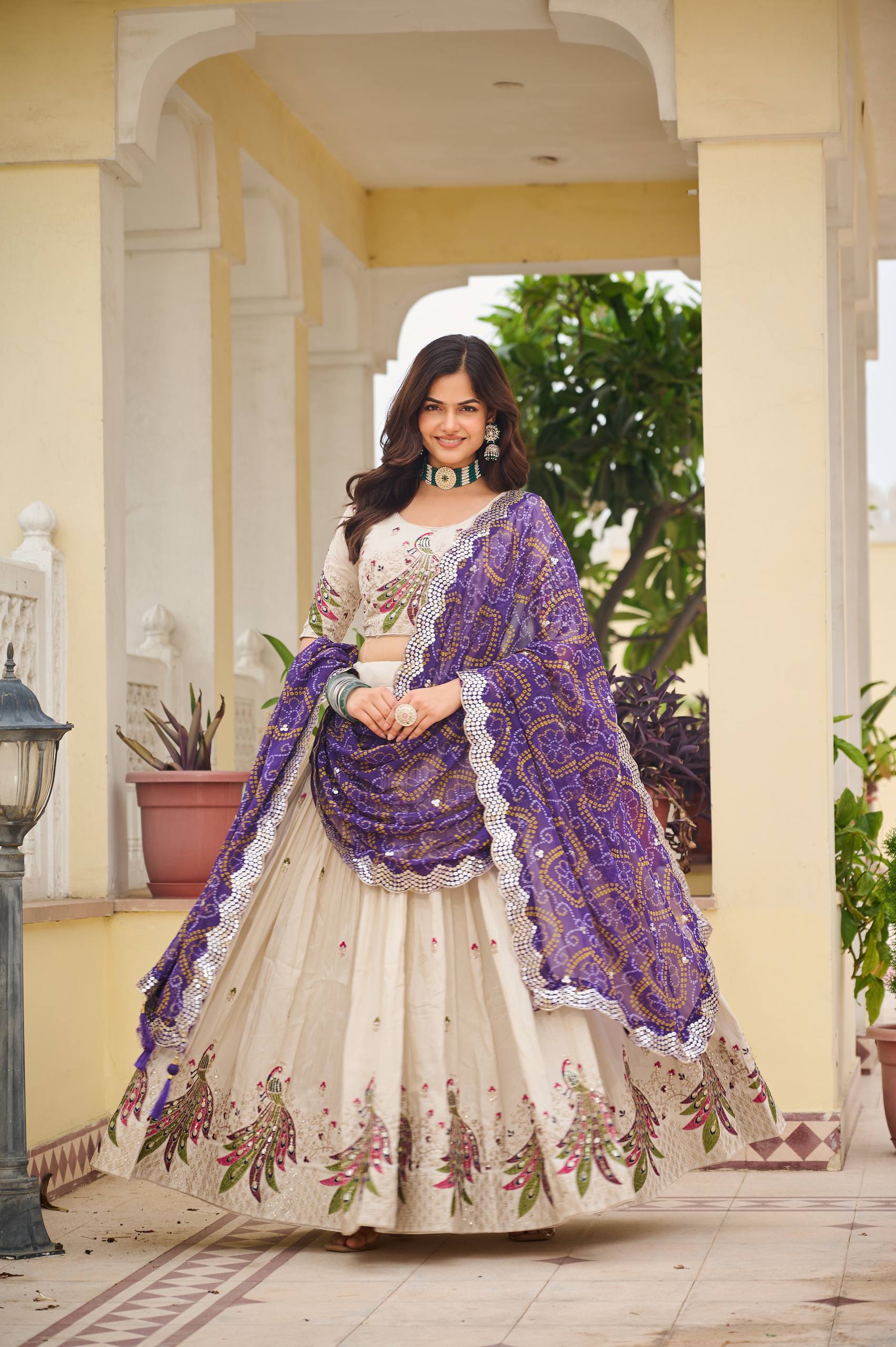 Wonderful Embroidery Work White Color Lehenga With Purple Dupatta