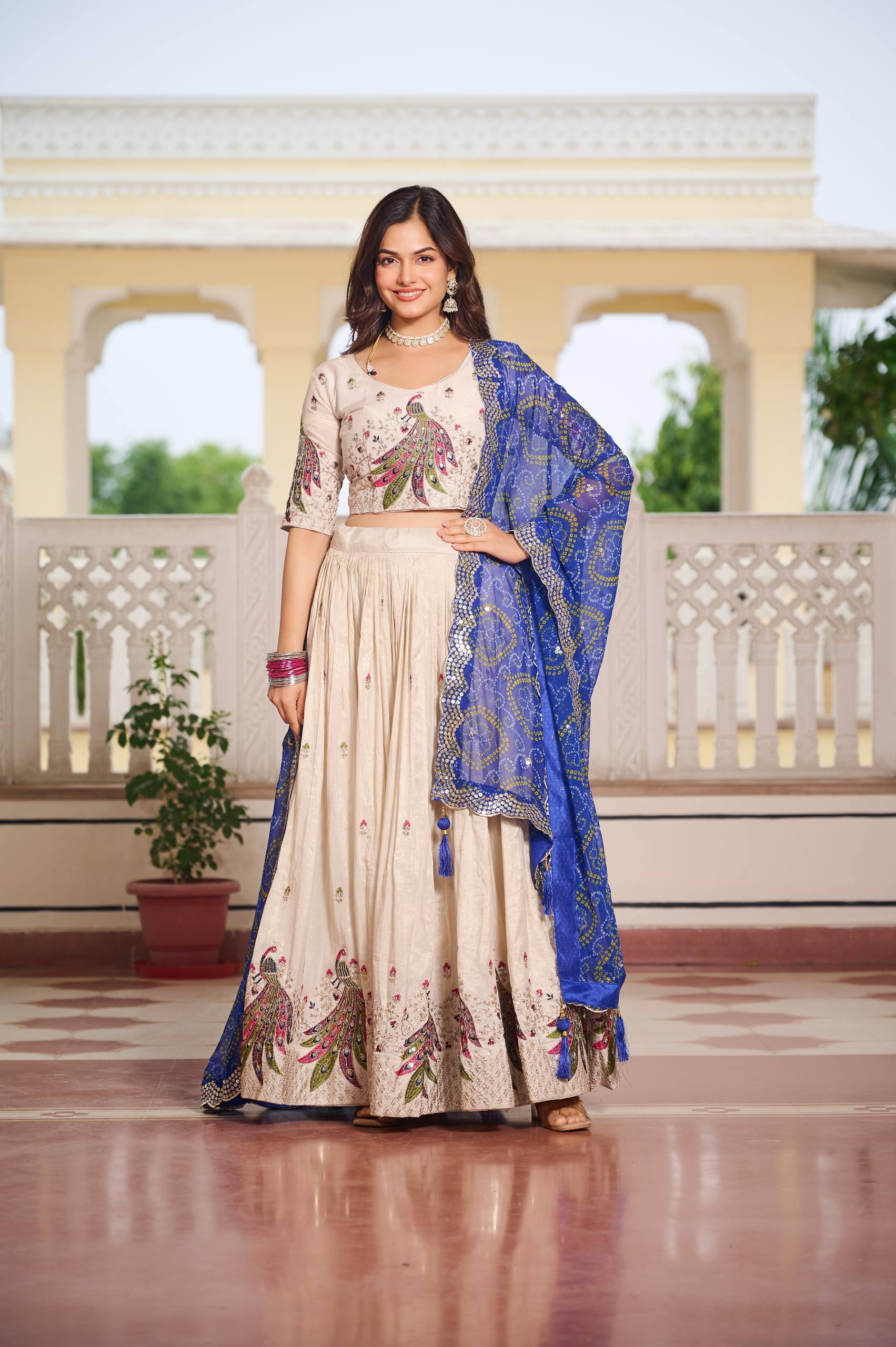 Wonderful Embroidery Work White Color Lehenga With Blue Dupatta