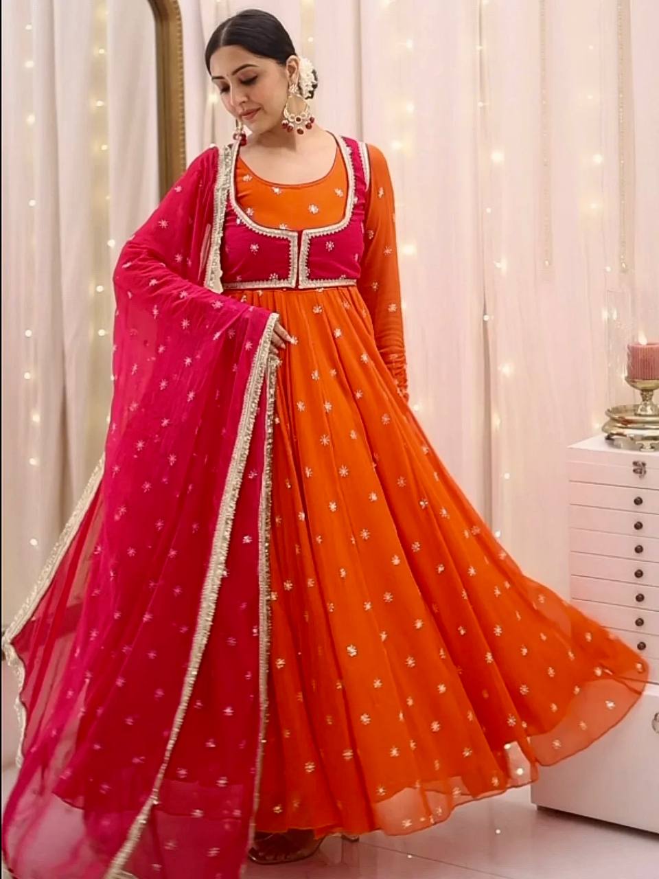 Attractive Orange Color Embroidered Gown With Koti