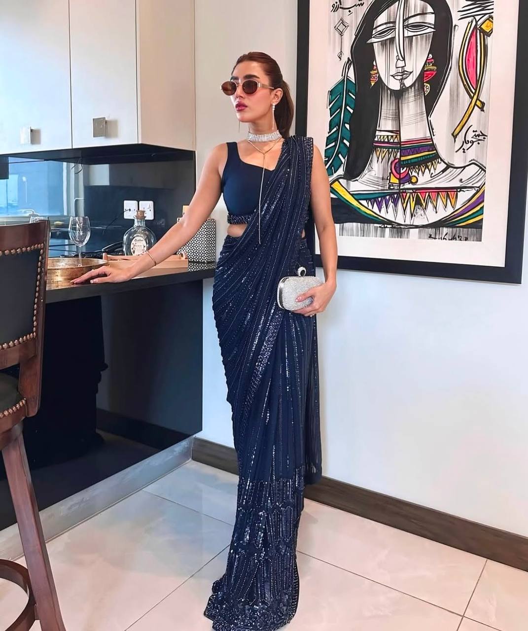 Glimmering Navy Blue Georgette Thread Work Saree