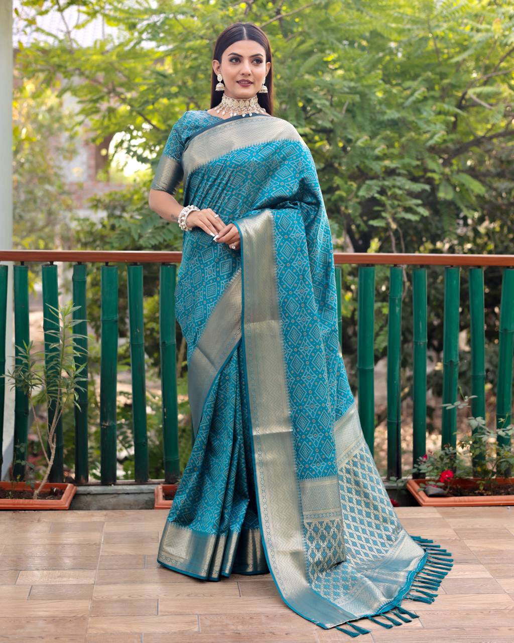 Teal Blue Color Bandini Patola Design Saree